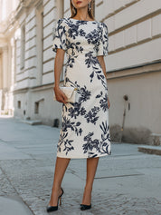 Elegancka sukienka midi z krótkim rękawem w botaniczny wzór