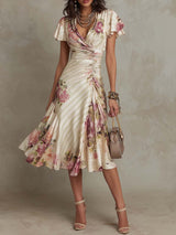 Elegancka vintage sukienka midi w kwiaty z satyny