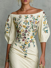 Sukienka damska w kwiatowy wzór z rękawami 3/4 i rozcięciem